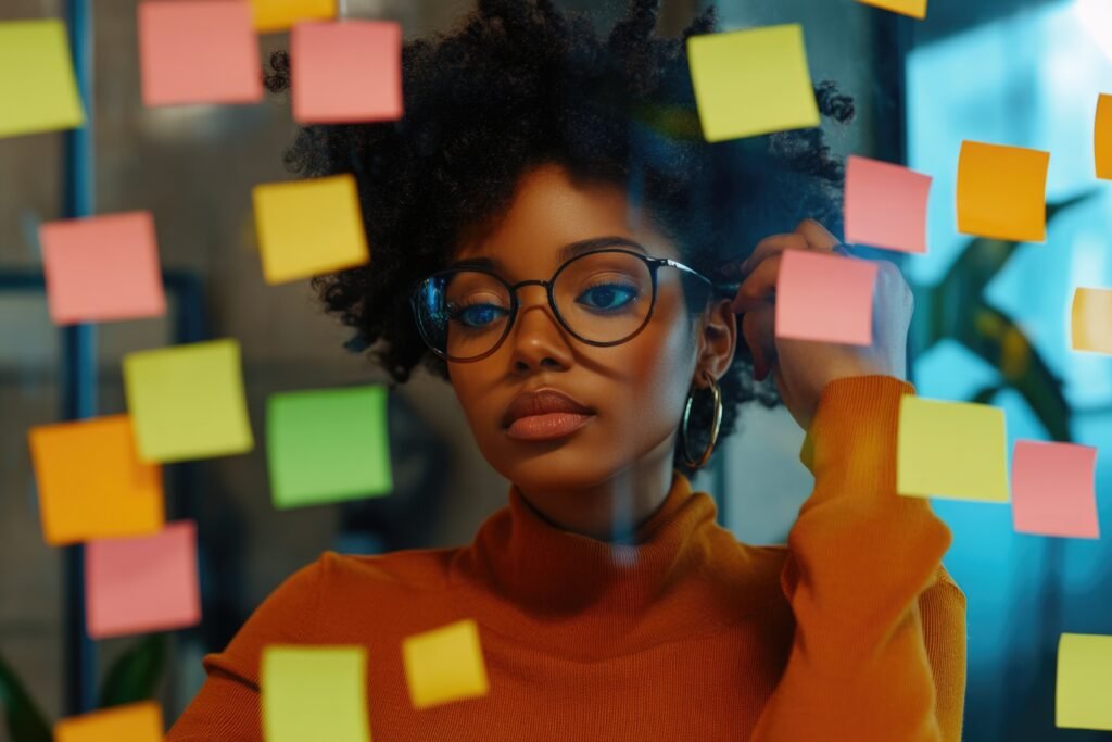 Woman in front of post-it note wall
